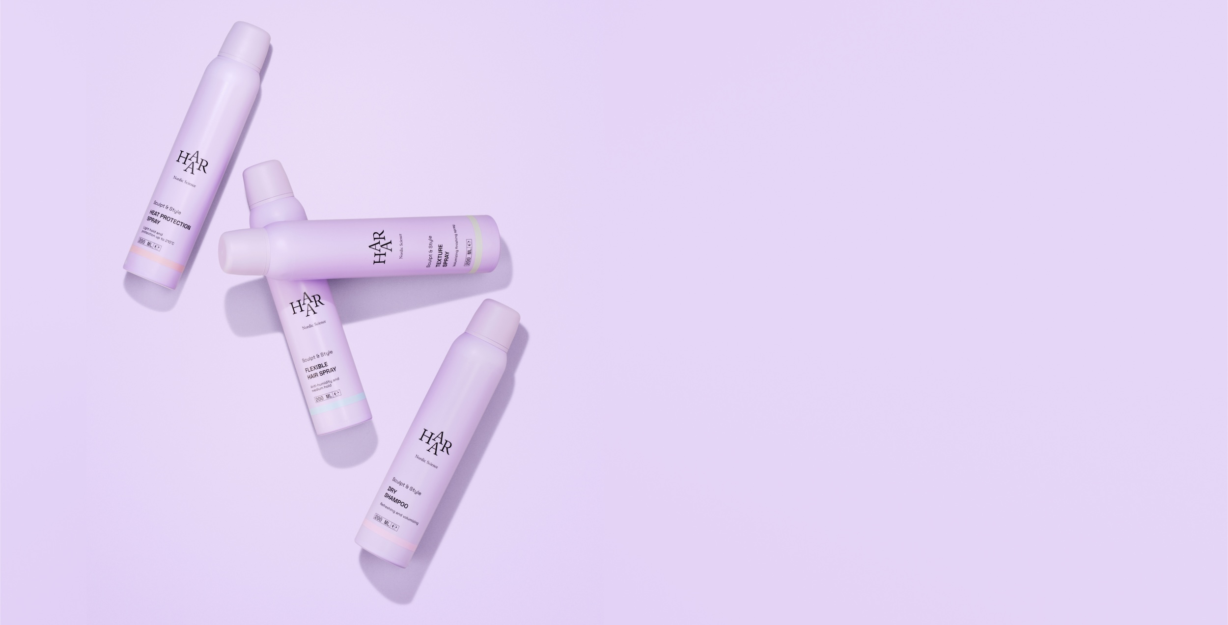 Haar lanserer ny stylingserie – bilde av fire lilla produkter fra serien (heat protection spray, flexible hair spray, dry shampoo og texture spray) mot lys lilla bakgrunn